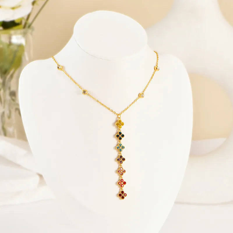 Collier Pendentif Trèfle à Quatre Feuilles & Charm Flottant — Doré