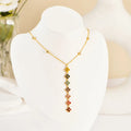 Collier Pendentif Trèfle à Quatre Feuilles & Charm Flottant — Doré